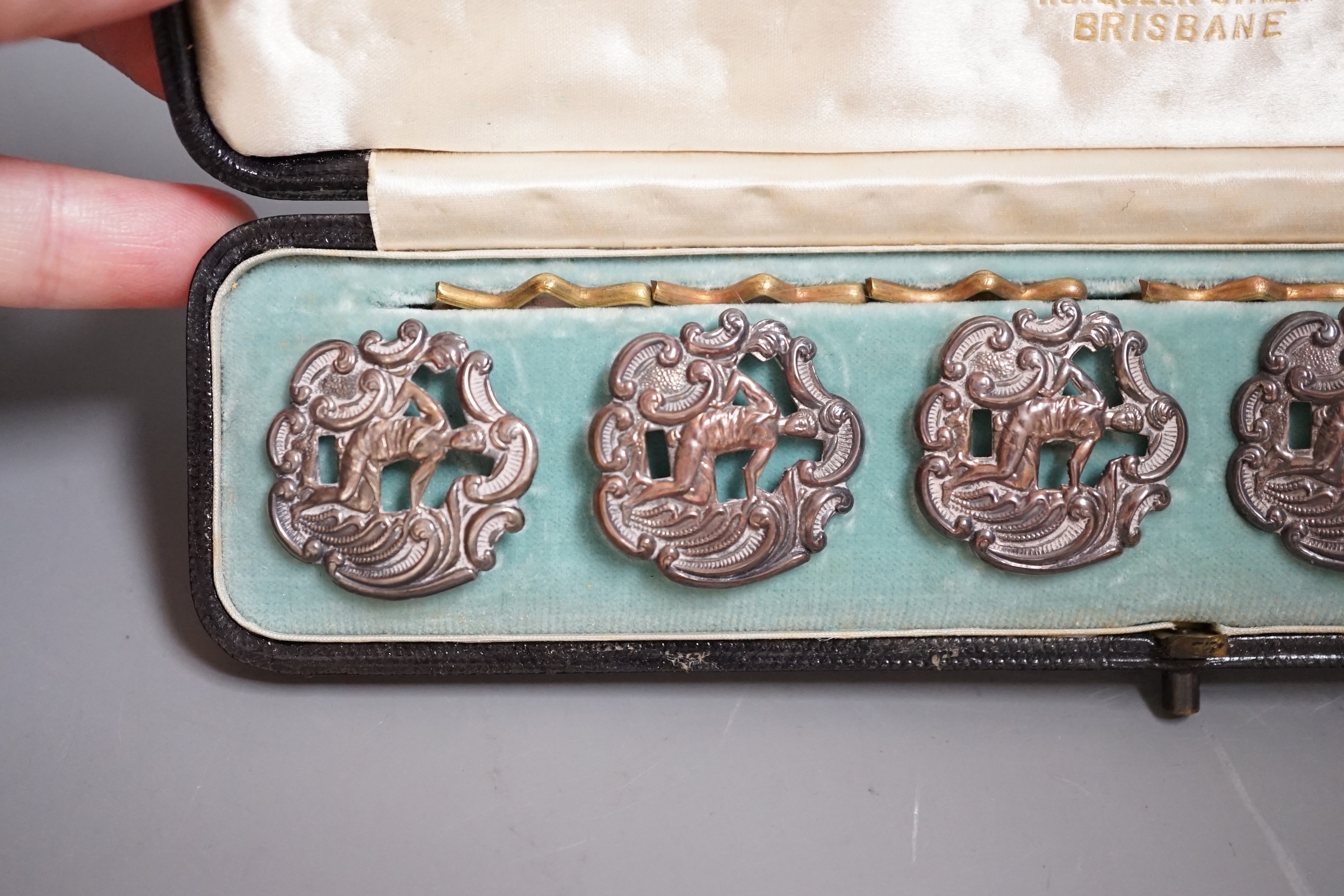 A cased set six late Victorian pierced silver dress buttons, depicting a gentleman wearing a toga, Levi & Salaman, Birmingham, 1899, 25mm.